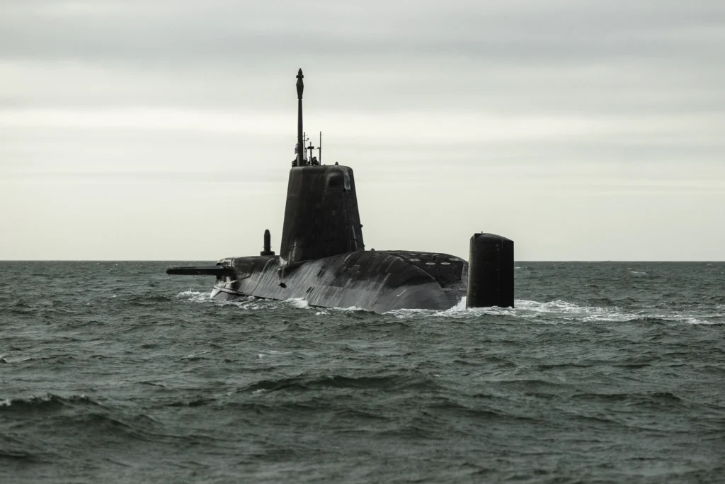 Submarine surfacing in the ocean