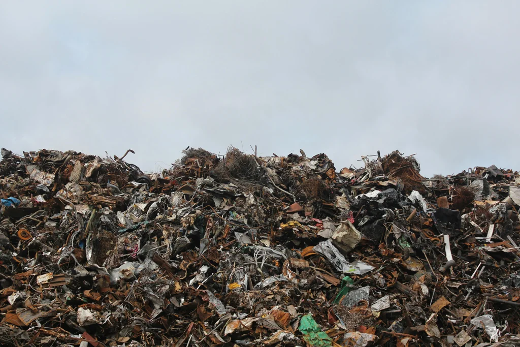 Piled waste at recycling centre